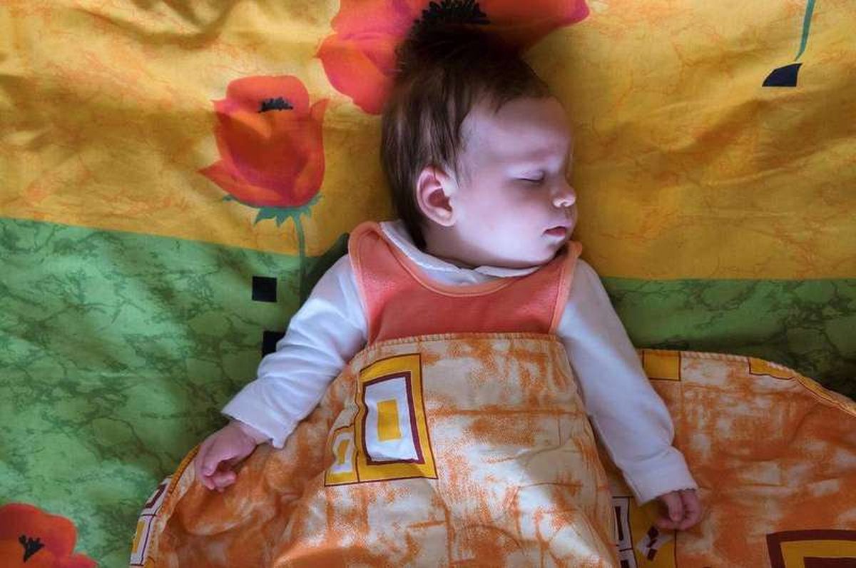 When Do Babies Start Sleeping Through the Night by Month?