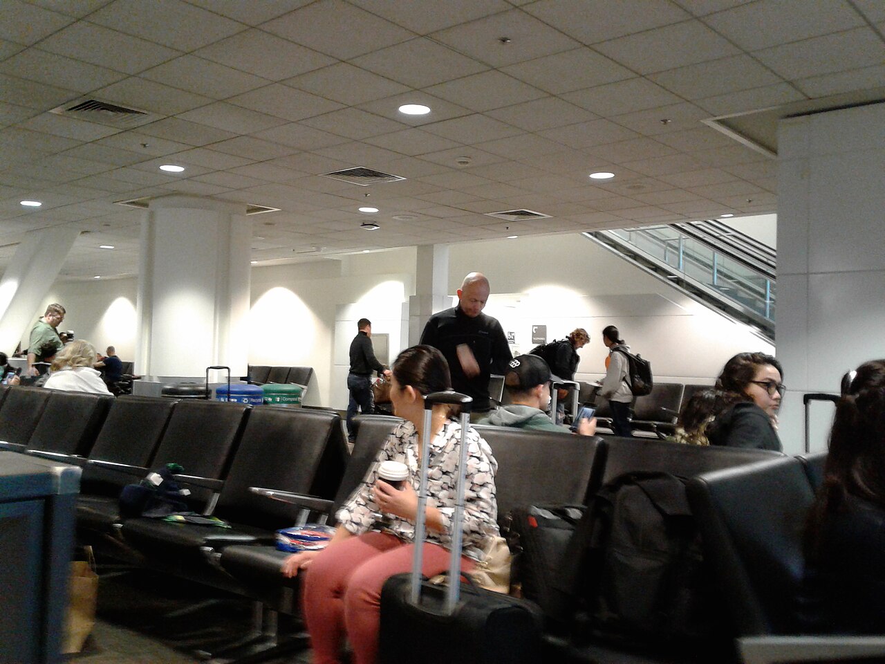 Why do airlines overbook flights and how does bumping work?