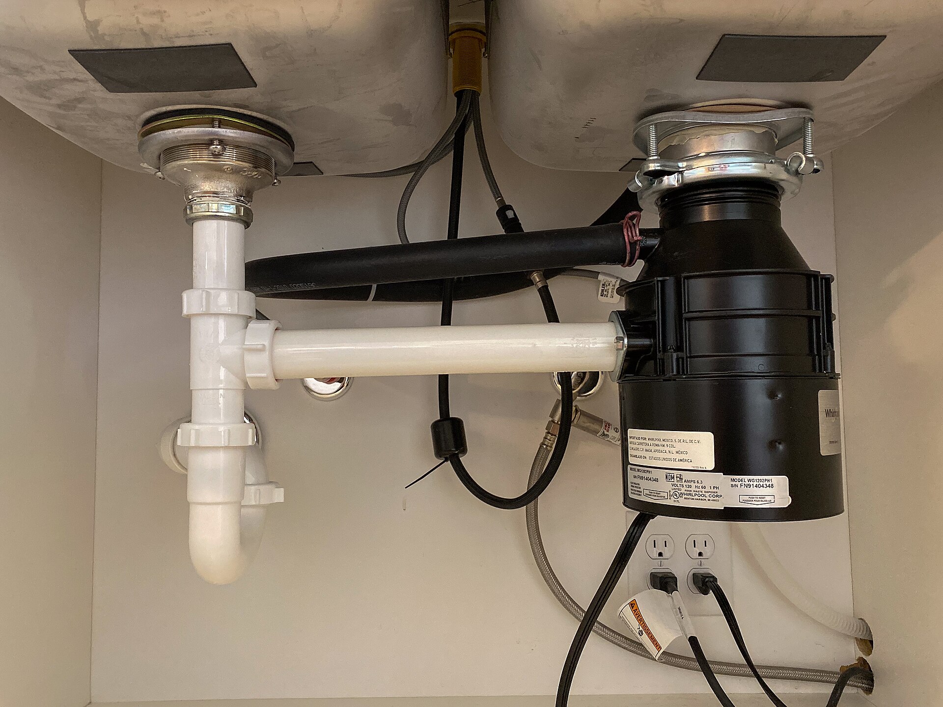 Why your garbage disposal hums but will not spin